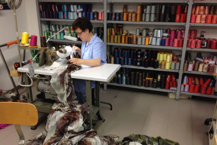 IMG_2207 lady hemming a silk scarf by machine